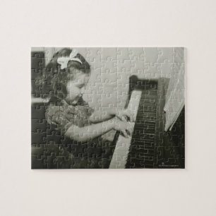 Quebra-cabeça Menina que joga o piano