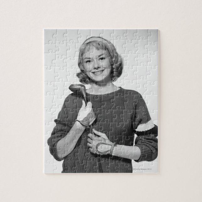 Quebra-cabeça Mulher que guardara o clube de golfe (Vertical)