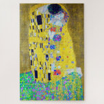 Quebra-cabeça O Beijo, Gustav Klimt<br><div class="desc">Gustav Klimt (14 de julho de 1862 - 6 de fevereiro de 1918) foi um pintor simbólico austríaco e um dos membros mais proeminentes do movimento Secessão de Viena. Klimt é notado por suas pinturas, murais, esboços, e outros objetos de arte. Além de suas obras figurativas, que incluem alegorias e...</div>