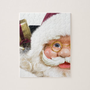 Quebra-cabeça O retrato de Papai Noel enfrenta e presentes