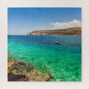 Quebra-cabeça paisagem marinha com pequeno barco pescador