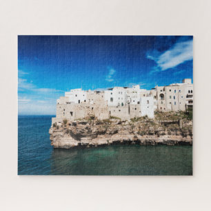 Quebra-cabeça Polignano que uma égua abriga em um penhasco em