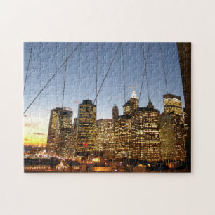 Quebra-cabeça Ponte de Brooklyn ao anoitecer com a silhueta de M