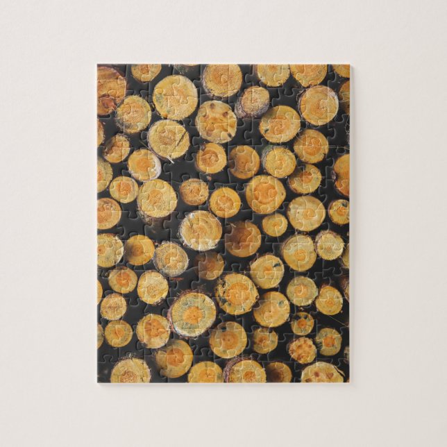 Quebra-cabeça Registros de árvores de madeira cortada empilhada (Vertical)