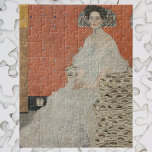 Quebra-cabeça Retrato de Fritza Riedler por Gustav Klimt<br><div class="desc">Retrato de Fritza Riedler (1906) por Gustav Klimt é uma pintura de retrato de arte vitoriana do simbolismo das artes plásticas. Fritza Riedler está sentada em uma cadeira de braço decorada com motivos dourados e prateados em forma de olho. Os quadrados ouro e prata repetem-se na parede de trás. Sobre...</div>
