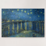 Quebra-cabeça Starry Night Over the River Rhone (por van Gogh)<br><div class="desc">Esta design apresenta uma pintura do artista Poste-impressionista holandês Vincent van Gogh (1853-1890), que é amplamente reconhecido como uma das figuras mais influentes da história da arte ocidental. É uma pintura paisagística que mostra a cidade francesa de Arles à noite na margem do rio Rhône. A cena escolhida por van...</div>