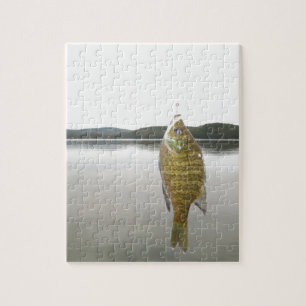 Quebra-cabeça Sunfish amarelo na seta do lago