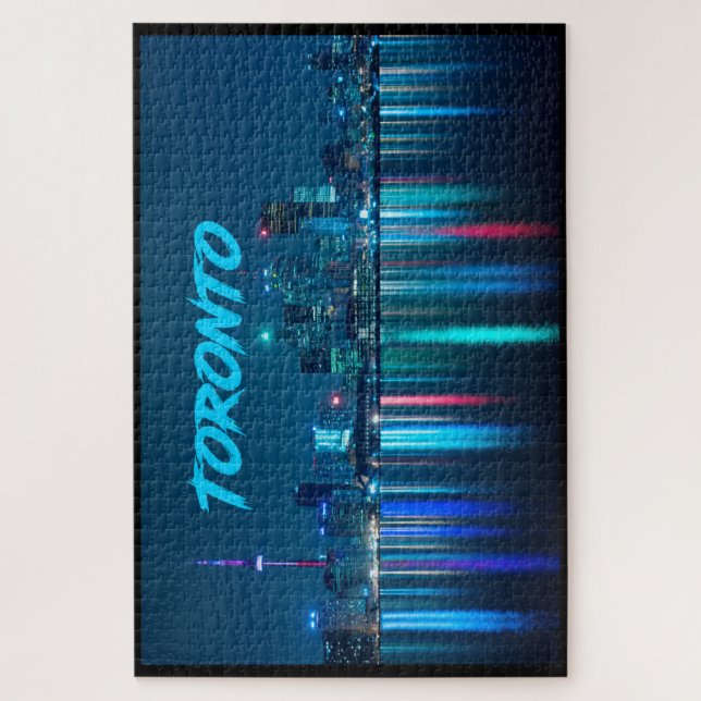 Quebra-cabeça Toronto Canada Nightime Skyline over Water Name (Vertical)