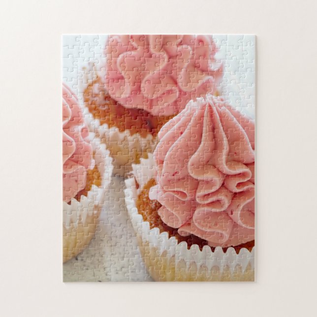 Quebra-cabeça Um Cupcake doce de tratamento com Glacé rosa (Vertical)