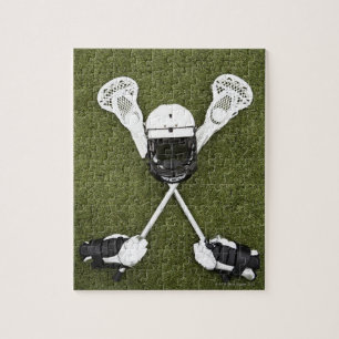 Quebra-cabeça Varas do Lacrosse, luvas, bolas e capacete dos
