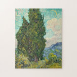 Quebra-cabeça Vincent Van Gogh Cypress<br><div class="desc">Belo trabalho de arte impressionista famoso pintor impressionista Vincent Van Gogh. Esta arte impressionista mostra ciprestes em um campo em frente a nuvens girando e uma lua no céu. As lágrimas, amarelos e verdes fazem um quebra-cabeça adorável.</div>