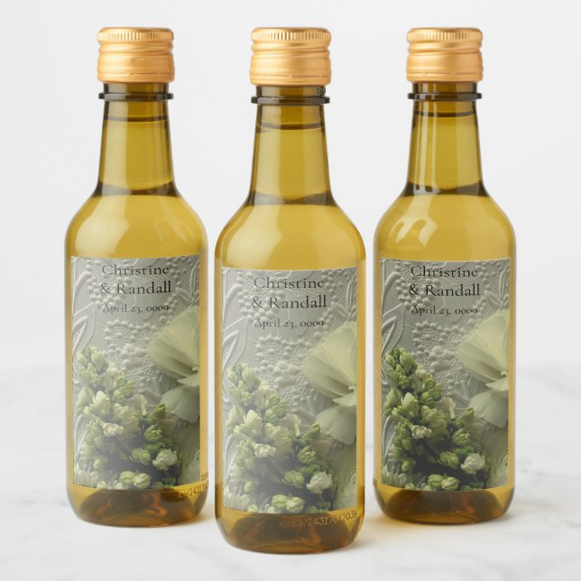 Ranunculus brancos e lilases em papel texturizado (Garrafas)