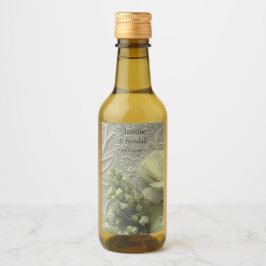 Ranunculus brancos e lilases em papel texturizado