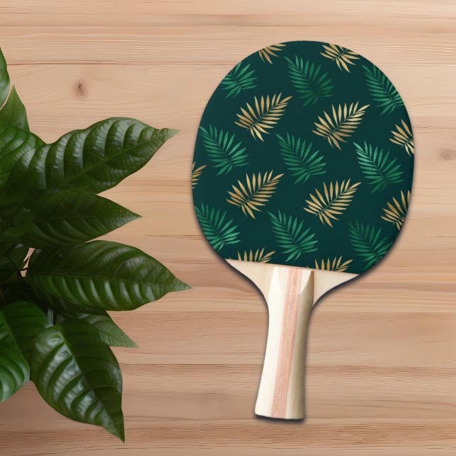 Raquete De Ping Pong Brilho verde e Dourado nas folhas tropicais (Criador carregado)