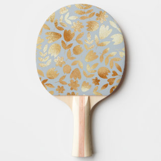 Raquete De Ping Pong Douradas flores, fundo azul, imitação de folhas.