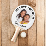 Raquete De Ping Pong Foto personalizada da mãe<br><div class="desc">Celebre a maior mãe do mundo com esta divertida pá de pingue-pongue branca e preta. Personalize facilmente com uma fotografia favorita (recorte se necessário para um quadrado com os sujeitos no meio antes de carregar). Você pode personalizar "Nós te amamos mãe" para algo em tamanho semelhante como "Melhor Mãe de...</div>