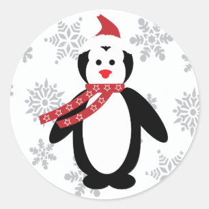 Redondo Pinguim na neve com Papai noel no adesivo