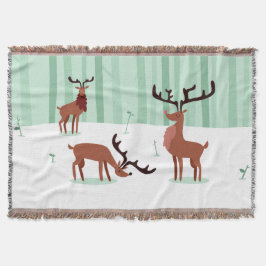 Reindeiros bonitos jogam cobertor