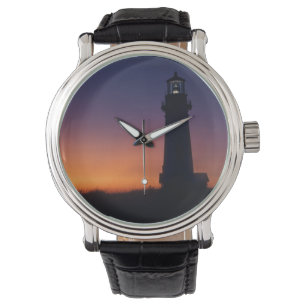 Relógio A bola de sol cai no horizonte colorido