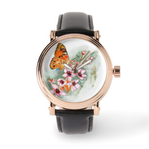 Relógio Borboleta sobre flores de cereja