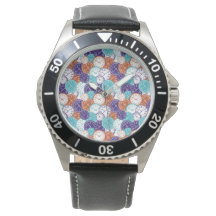 Relógio de prata com um mostrador mosaico geométri