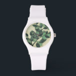 Relógio De Pulso Folhas e Ramificações no Fundo de Creme<br><div class="desc">Folhas e ramos verdes vibrantes descansam sobre um fundo creme nesta impressão por Jennifer Goldberger. À medida que a estação muda,  as cores dessas folhas permanecem as mesmas,  trazendo uma certa consistência à sua vida.</div>