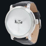 Relógio Eterno "KING" Corda preta de couro preta<br><div class="desc">Estilo: Design da Vintage Black Leather Strap Watch: Este sofisticado relógio estilo vintage apresenta uma pulseira preta de couro que exumenta a elegância do eterno. O rosto do relógio exibe orgulhosamente a palavra "rei" em impressão ousado, luxuoso, simbolizando força e autoridade. Feito para homens que apreciam uma mistura de estilos...</div>