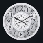Relógio Grande Art Deco Elegante na moda faux prata unisex presen<br><div class="desc">Uma ilustração de arte antiga,  com círculos falsos prateados revestidos de preto,  ao redor dos quais aparecem os rabiscos pretos,  é enquadrada por um círculo branco menor,  no qual aparecem os algarismos romanos.</div>
