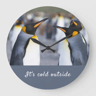 Relógio Grande Está frio fora da foto do Rei Pinguin com texto