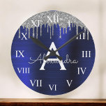 Relógio Grande Monograma de metal com Marinho de prata azul esfre<br><div class="desc">Folha de Marinho azul de folha de papel metálico brilhante escovou o nome do monograma de metal e o relógio de parede de luxo inicial. Isso faz o doce presente de 16 anos, casamento, chá de panela, aniversário, chá de fraldas ou festa de solteira perfeito para alguém que ama luxo...</div>