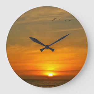 RELÓGIO GRANDE POENTE OCEÂNICO COM AVES MIGRATÓRIAS
