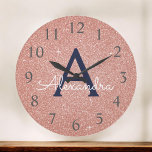 Relógio Grande Rose Gold Navy Blue Sparkle Glitter Monogram Name<br><div class="desc">Pink Rose Gold and Navy Blue Sparkle Glitter Monogram Name and Initial Serving Wall Clock. The Wall Clock makes the perfect gift for someone who loves pink sparkle glitter.</div>