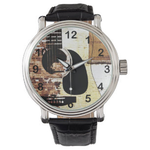 Relógio guitarra acústica no fundo do tijolo