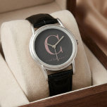 Relógio Monograma de Caligrafia Elegante em Preto e Dourad<br><div class="desc">Monograma de Rótulo Elegante e Chic em Rosa Dourado em um Relógio Preto Chic. Fácil de personalizar com seu próprio nome e detalhes. Perfeito para o seu estilo de vida de luxo! Por favor,  entre em contato conosco em cedarandstring@gmail.com se precisar de ajuda com o design ou produtos correspondentes.</div>