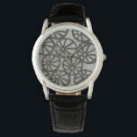 Relógio Pedra - Rodas<br><div class="desc">Pedra IV de Chariklia Zarris. Padrão com formas semelhantes a rodas repetidas.</div>