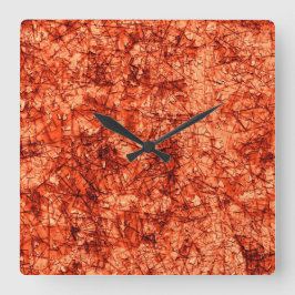 Relógio Quadrado Arranhões em arranhões num coral ligeiramente vist