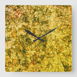 Relógio Quadrado Arranhões numa imagem amarela clara