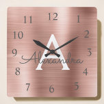 Relógio Quadrado Cora cor-de-rosa - o nome metálico Dourado<br><div class="desc">Coram cor-de-rosa - o nome de aço inoxidável do monograma da folha do falso Dourado cor-de-rosa e o pulso de disparo de parede personalizado original feito sob encomenda inicial para a casa ou o escritório. O pulso de disparo de parede faz o Natal ou o doce perfeito presente de 16,...</div>