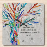 Relógio Quadrado Crie sua própria citação inspiracional/motivaciona<br><div class="desc">Este relógio de parede único é decorado com um mosaico colorido,  Tree of Life design. Adicione a citação escolhida para personalizá-la. Clique em Personalizar Mais para editar a fonte,  o tamanho da fonte e a cor da fonte. Mosaico original © Michele Davies.</div>