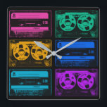 Relógio Quadrado Fitas de Cassete Coloridas Retroativas<br><div class="desc">Nos anos oitenta todos vestiam fones de ouvido e ouviam suas músicas em um tocador de cassetes portátil. Insira seu cassete e você tinha música em qualquer lugar a qualquer hora, até que Side A terminasse e a fita tivesse que ser virada para Side B. As Pessoas poderiam até fazer...</div>
