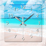 Relógio Quadrado Foto do oceano de turquesa de praia tropical do Ha<br><div class="desc">Lembre-se do cheiro fresco de sal do ar do oceano sempre que você verifica o tempo nesse incrível relógio de fotos, de cor vibrante. Exalar e explorar a solidão de uma praia havaiana vazia. Sua escolha de um relógio quadrado ou redondo. Faz um presente excelente para o lar! Você pode...</div>