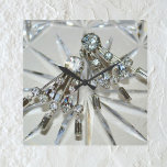 Relógio Quadrado Glam Vintage Art Deco Rhinestones Acrínicos<br><div class="desc">A imagem fotográfica dos brincos de pintura de arte deco rhinestone adiciona o retroglam a esse elegante e glamouroso relógio de parede acrílica. A joia de artdeco está sobre um fundo de cristal recortado. O olhar geral é uma cinza de prata que parece brilhar com pistas de azul pálido gelado....</div>