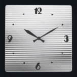 Relógio Quadrado Listras de prata do cetim do art deco<br><div class="desc">Um pulso de disparo geométrico do teste padrão listrado do art deco elegante em um inclinação do cetim da prata/cromo,  com um leve,  aumentou,  um efeito de 3 d e grandes números pretos em uma pia batismal de Deco</div>