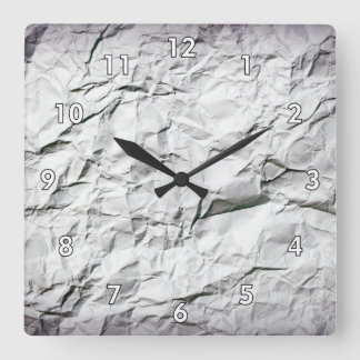 Relógio Quadrado Livro Branco embrulhado sobre a captura de olhos