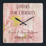 Relógio Quadrado Lovely Chic Floral Wedding<br><div class="desc">Um adorável relógio romântico faz um presente memorável para um casal. De recém-casados a casais em seus ouros anos, este design apresenta um adorável fundo floral rosa com fonte burgundy complementar. Use a modelo para preencher suas informações pessoais. Faça esse relógio seu hoje! Arte: moradia</div>