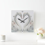 Relógio Quadrado Monograma de Cisnes Românticas<br><div class="desc">Crie uma lembrança especial para sua casa. Este relógio de parede quadrada monograma tem cisnes românticas. Cores neutrais. Personalize os monogramas exibidos no centro. Faz um presente de excelente,  presente de casamento,  presente de aniversário de casamento e muito mais. Use a modelo para personalizar.</div>