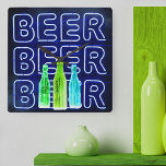 Relógio Quadrado Neon LED Beer Sinal Royal Blue<br><div class="desc">Relógio de parede quadrado impresso com sinal de bar de aparência neon. O design tem garrafas coloridas de cerveja e é escrito com a palavra BEER em LED strip-luz. Tem uma paleta colorida de azul real,  verde limão,  verde esmeralda e azul aqua. Navegue na nossa loja para procurar alternativos.</div>