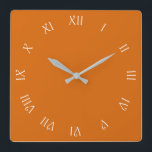 Relógio Quadrado Números romanos de script branco no wcn laranja<br><div class="desc">White Script Roman Numbers On Orange Wall Clock Design © Trinkets and Things 2017 - AHP Design. Todos os Direitos Reservados.</div>