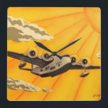 Relógio Quadrado Os anos 30 à moda do plano do art deco inspiraram<br><div class="desc">Um vintage dos anos 30 do art deco do na moda inspirou o avião com a nuvem do art deco e o sunburst no céu. Original pintado mão no acrílico por Emma Childs em EJLoriginalart.co.uk</div>