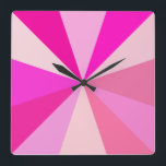 Relógio Quadrado Pop Art moderno dos anos 60, Raios Geométricos Fun<br><div class="desc">Este relógio quadrado de pop de arte,  inspirado na década de 60,  tem raios rosa psíquicos / explosões de sol a disparar num padrão geométrico. Há doze raios para marcar o tempo - não há necessidade de números neste relógio giro,  minimalista,  ultra-mod e giro. É groovy,  querida.</div>